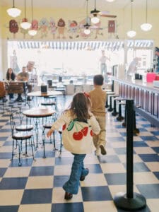 kids running in ice cream parlor