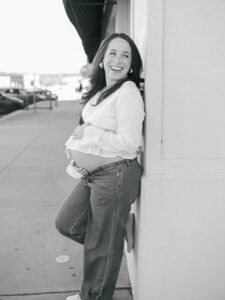 pregnant mom smiling outside